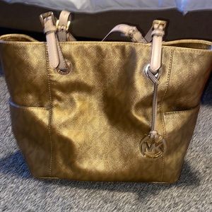 Michael Kors gold purse